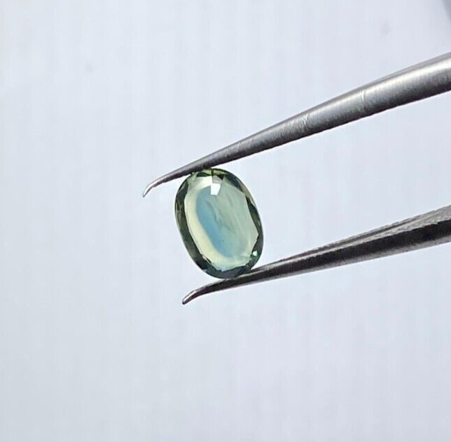 0.82 CTS HEATED MADAGASCAR BLUE/GREEN SAPPHIRE, OVAL CUT 6.5 X 5 X 2.8 MM VVS
