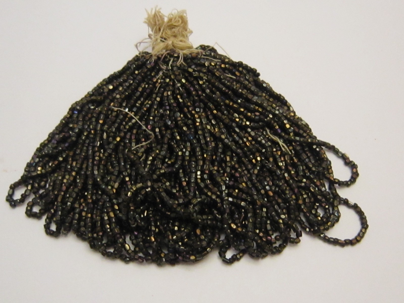 Hank Czech vintage dark topaz lustre faceted micro seed glass beads