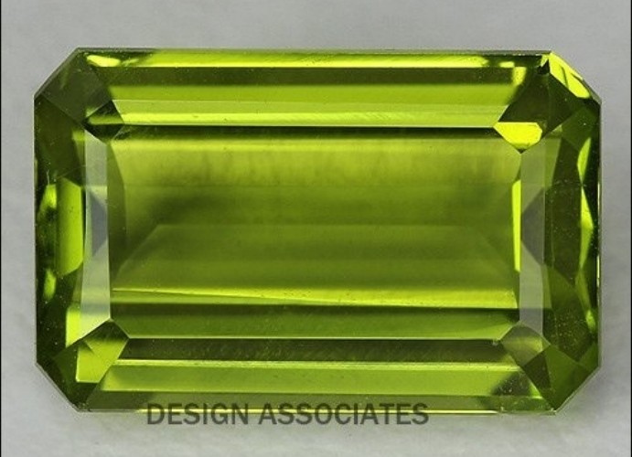 PERIDOT 9 X 7 MM EMERALD CUT ALL NATURAL
