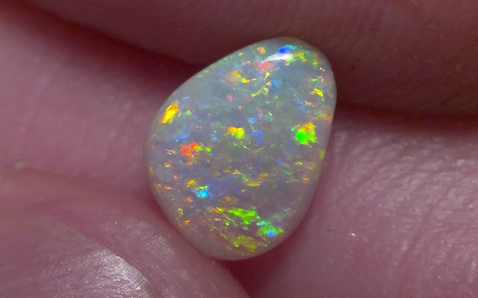 0.87cts Solid Lightning ridge opal, stunning rainbow fire & pattern *see video*