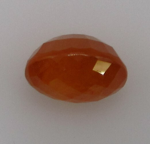 5.02 Carat, Yellow Orange Tangerine Garnet, 10 x 8 Oval, Very Slightly Included.